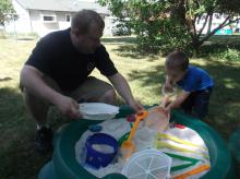 James and Daddy playing in the new sandbox